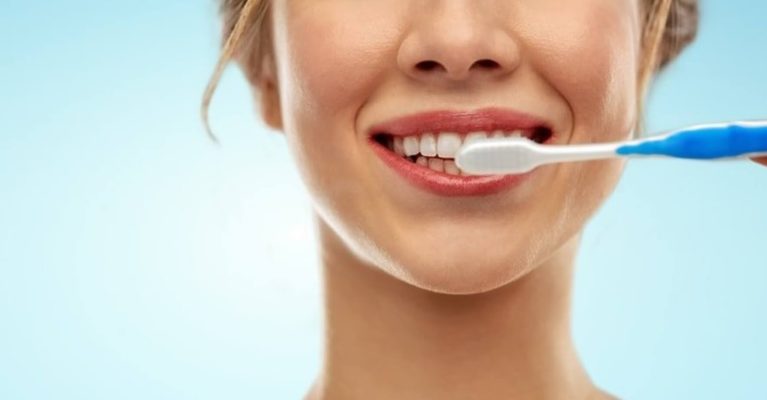 toothbrush in teeth line